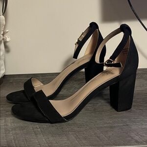 Black heels. Size 7 worn once.